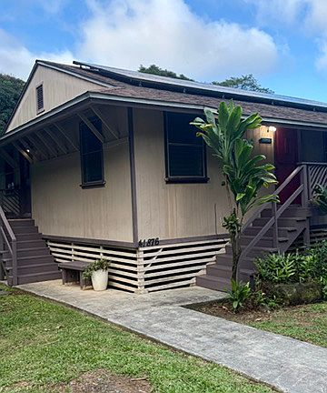 Traditional plantation style home built in the 1940's with an updated interior