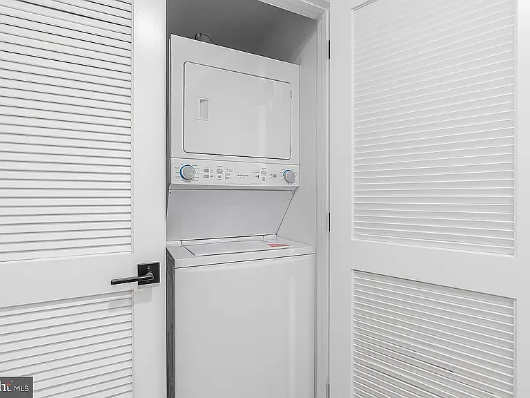 Stackable washer and dryer. In basement flexible living space.