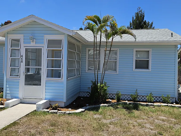 Front of house pictures with enclosed porch