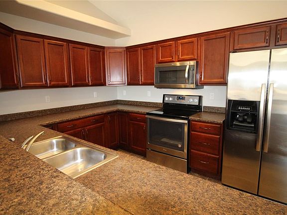 Lots of kitchen cabinetry plus new stove & microwave