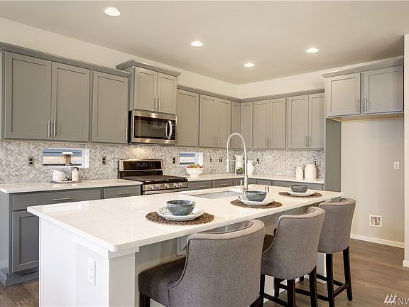 Example of Plan 2353 A built on another lot at Hawksbeard.  Details & colors will vary.