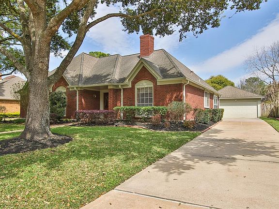 Featuring mature trees and located on a quiet non-through street, this beautiful home has a detached, double garage and wide driveway.