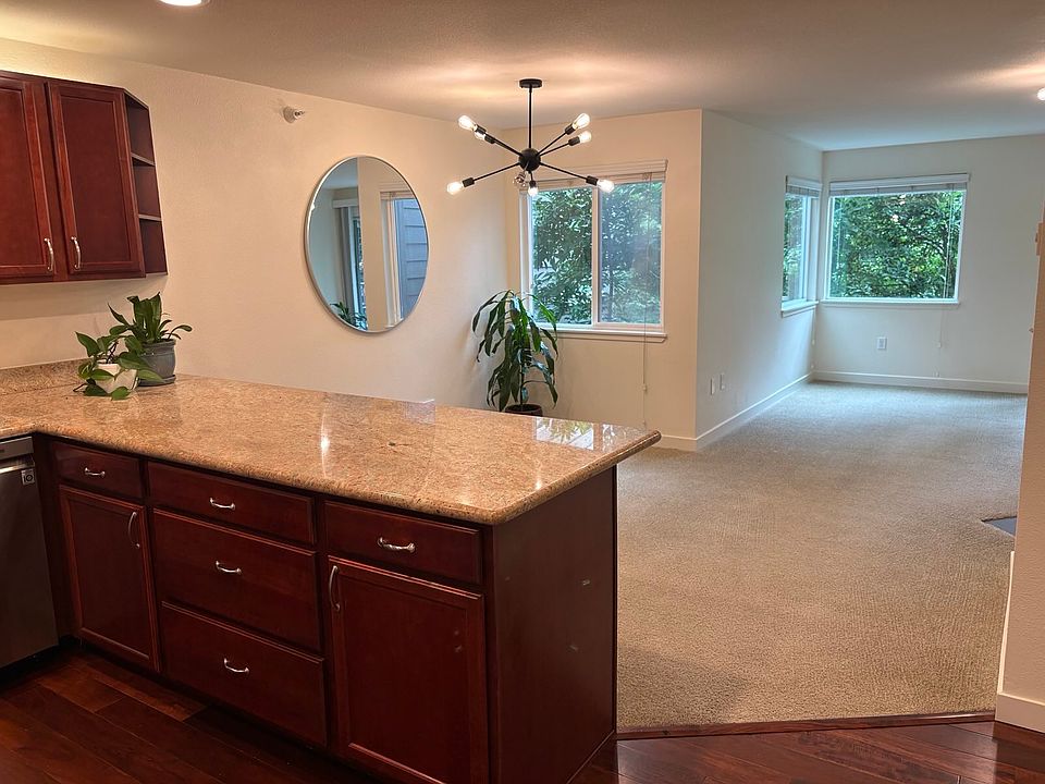View of dining and living areas from entry.