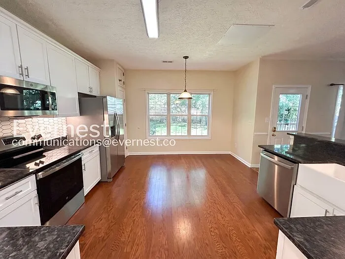 6228 Weathersfield Way — Photo 3
