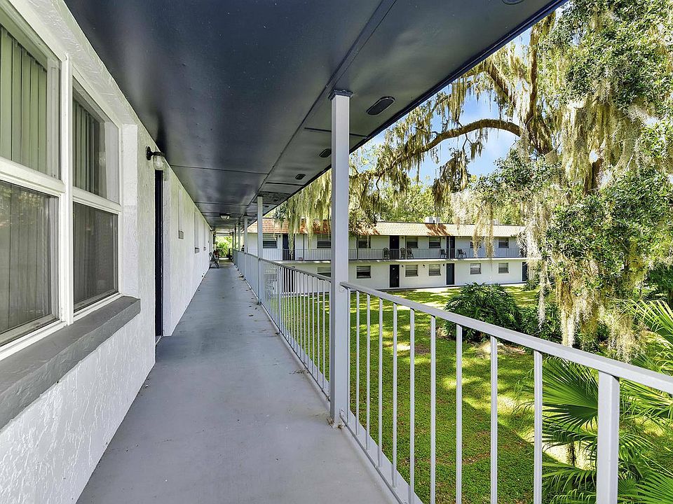 Experience peace and serenity from this picturesque apartment walkway.
