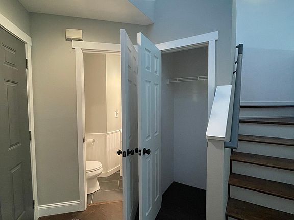 Front entry, half bath, coat closet