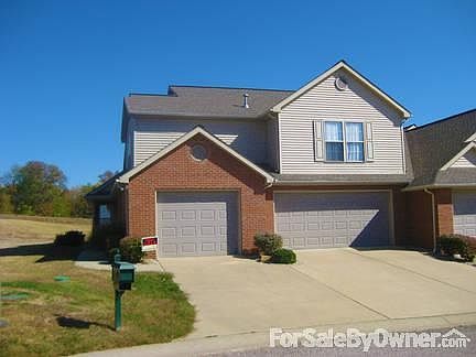Front View
						:
						2 car + 1 car garages. 1 car great for golf cart but will fir regular size car.