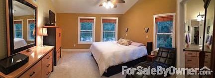 Kitchen and Dining Area with Bay Window View of Private Back Yard