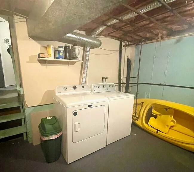 In-unit laundry and storage room with ample additional storage space.