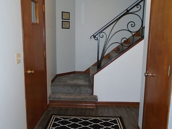 entryway, closet and stairs