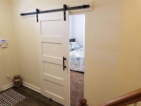 The first floor has a private bedroom and ensuite.  Perfect for a guest room, office or craft room.