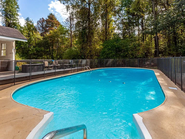 Pool ONLY OPEN May - September, HotTub open ALL YEAR. (Lounge chairs, pool bathroom, pool kitchen sink only usable/open in summer pool season.) Pool fence for safety around all year.
