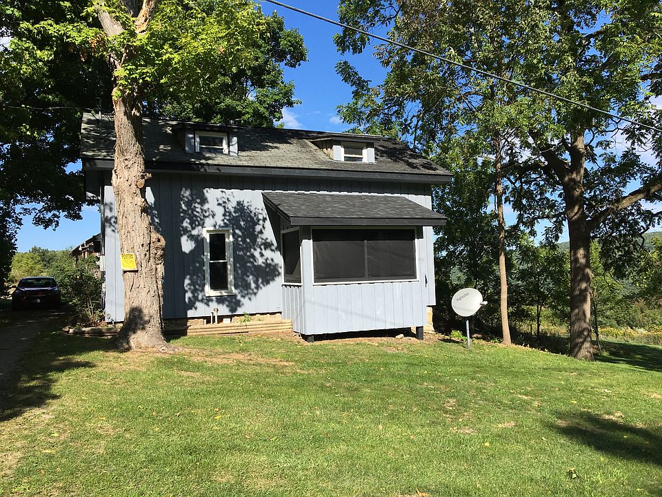 Front shows sleeping porch