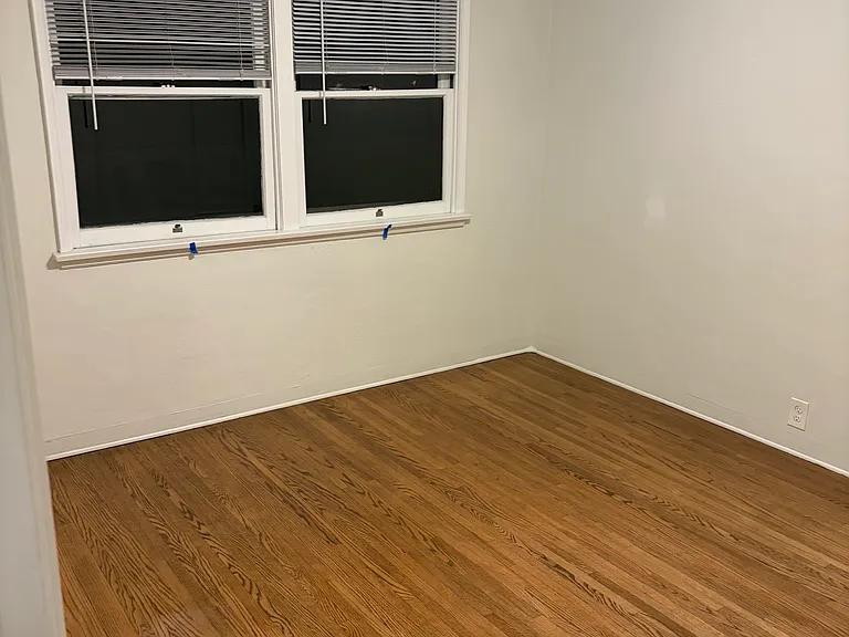Back bedroom with view of deck