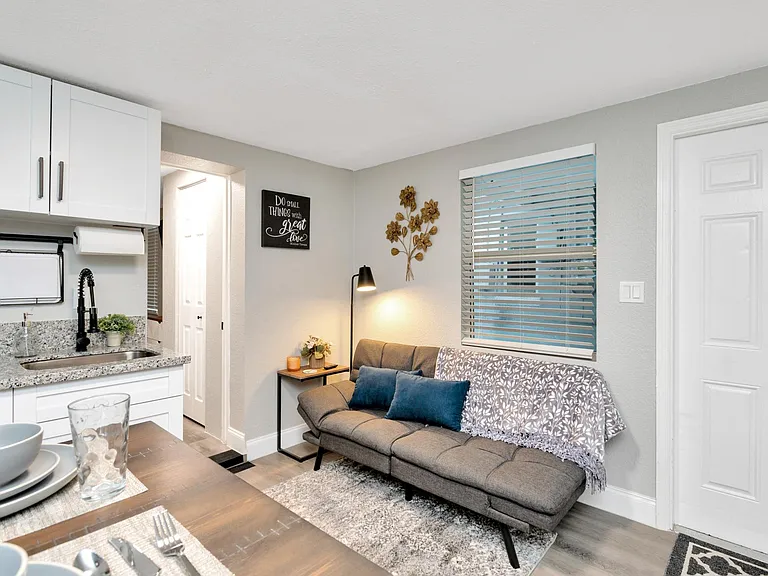 Relax after a hard day's work on this uber-comfortable couch which also turns into a well-supported memory foam futon if you're too tired to move to the bed and want to just sleep here for the night.