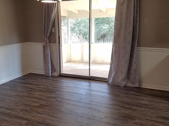 View of screened porch from eat-in kitchen
