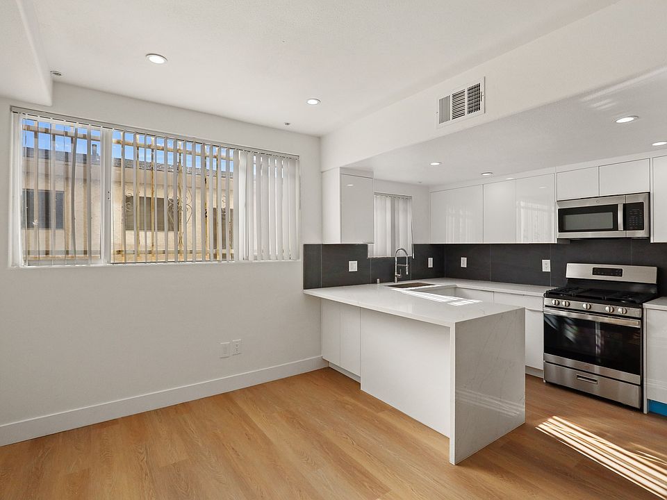 Dining and Kitchen Space with Vinyl Flooring