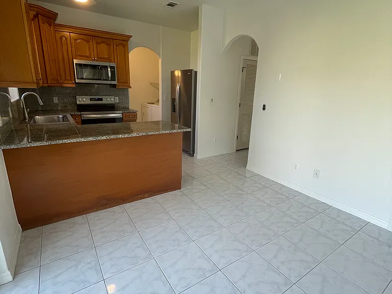 Formal dining room with access to the patio