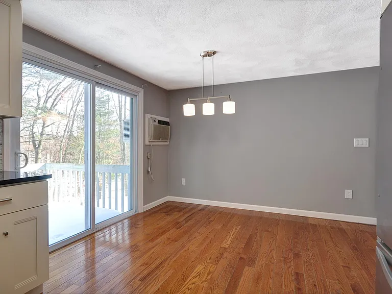 Dining area and sliders to deck