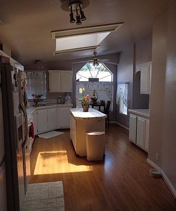 BEAUTIFUL GOURMET KITCHEN WITH ISLAND AND EATING AREA/LOTS OF STORAGE SPACE/PANTRY/GAS STOVE/DISHWASHER/MICROWAVE/ICE MAKER READY/SKYLIGHT