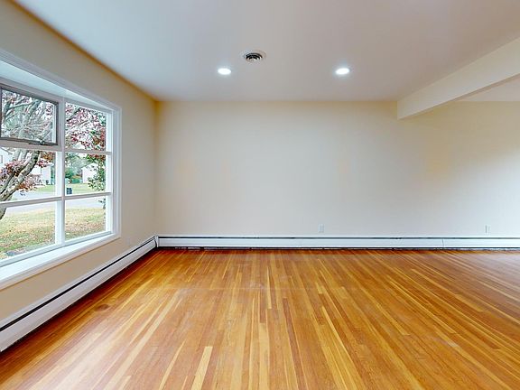 Living room dining room open concept with lots of natural light