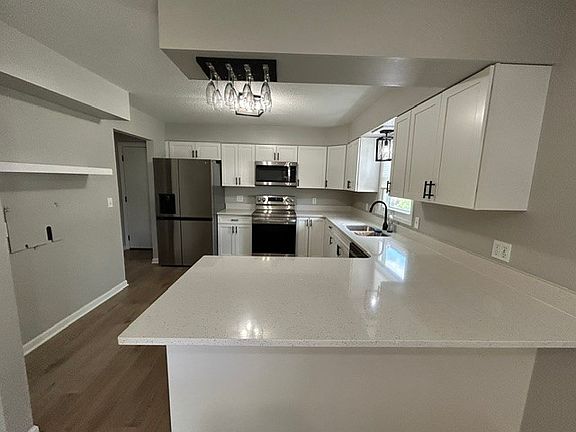 3rd image of 409 E 10th St