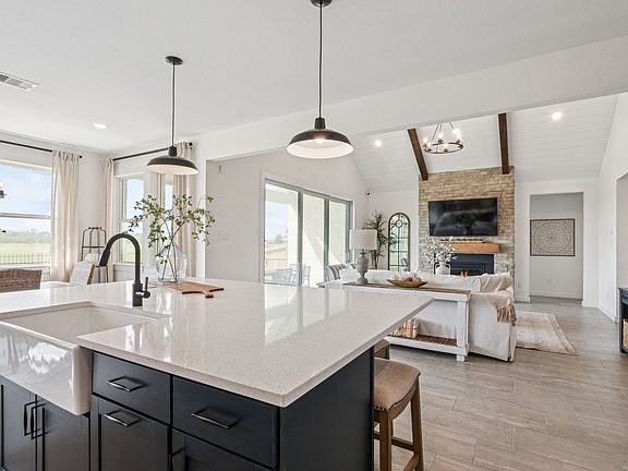 Kitchen with white apron-front sink