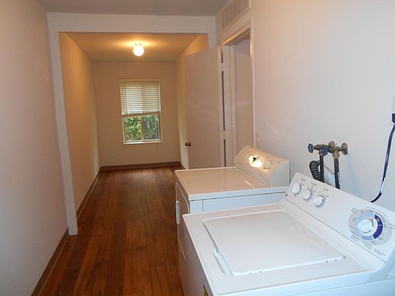 huge laudry and storage room with your very own full size wa
