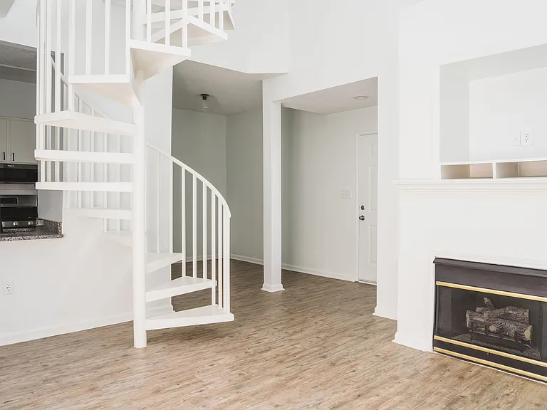 Loft-style home with spiral staircase
