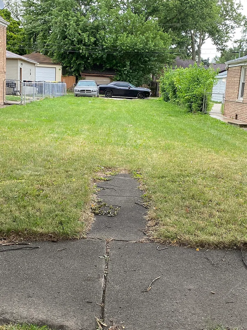 14217 Normal Ave photo 1