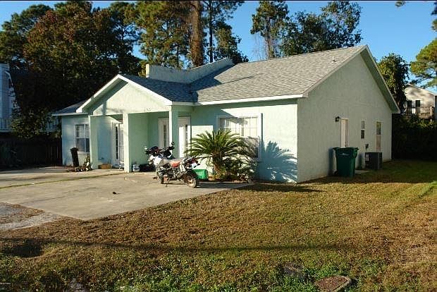 Outside of Duplex with Parking pad