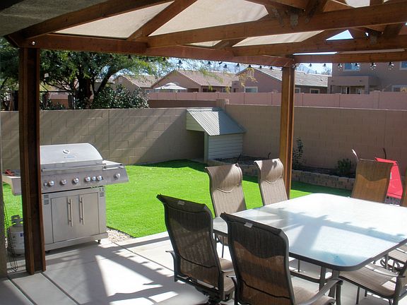 BBQ, turf, and pergola
