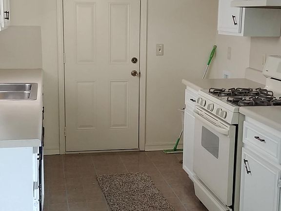 Kitchen with stove and dishwasher