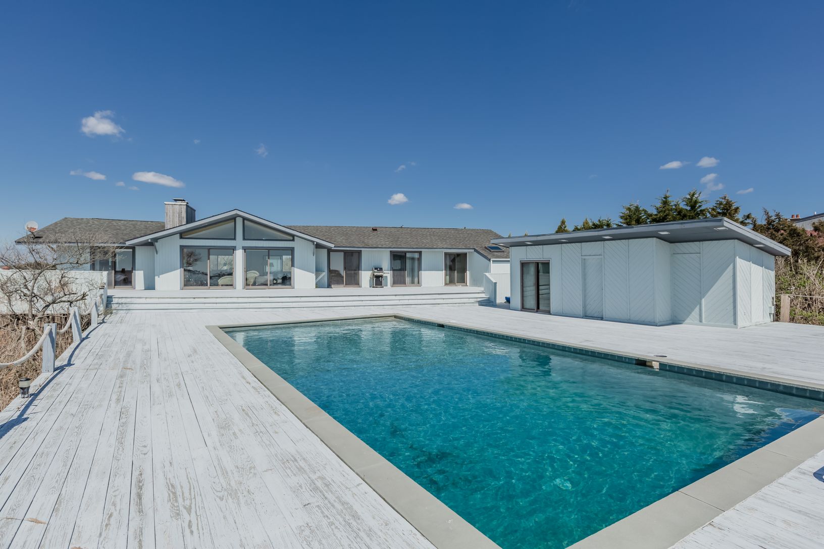Expansive deck with cabana with sauna & full bath