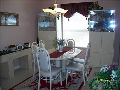 3rd image of 699 SW Lake Charles Cir