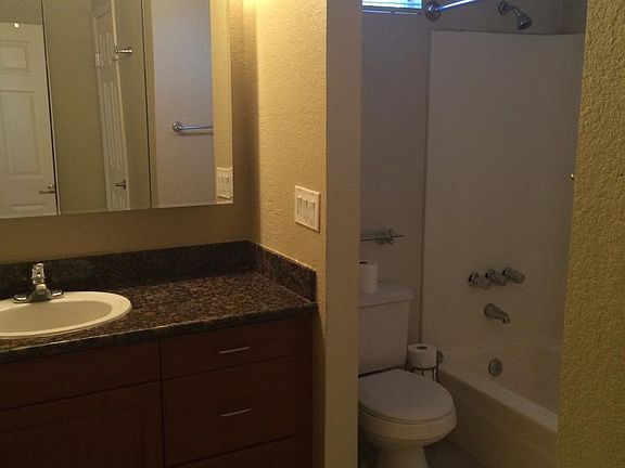 Large bathroom with shower/tub combination
