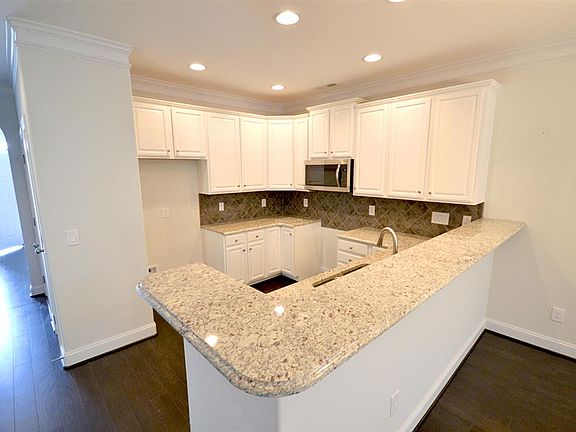 Kitchen With White Cabinets