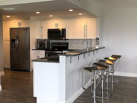 3rd image of 9660 W Bay Harbor Dr APT 4D
