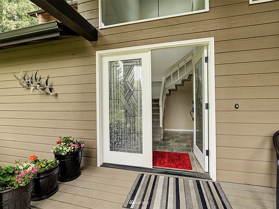Custom glass doors welcome you inside!