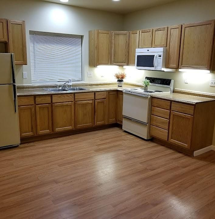 Kitchen with Appliances and Microwave and under cabinet lighting, plus ample cupboard space, including a Lazy Susan cabinet