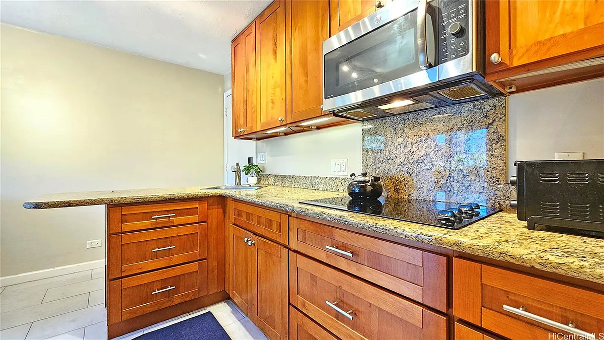 Building Photo - 1459 Pele St #203