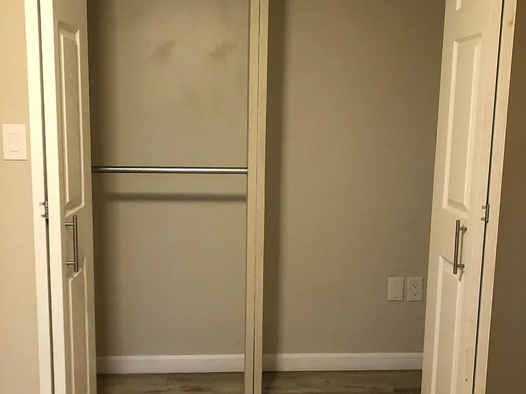 Small Bedroom/Office has a large closet with bi-fold doors