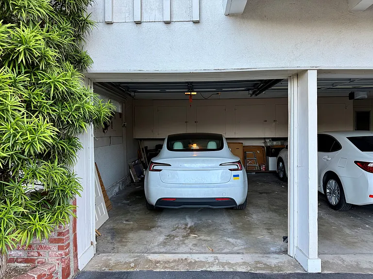 One parking space inside garage included
