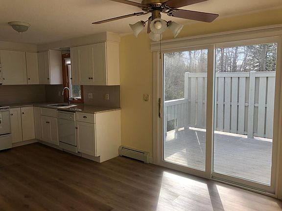 Kitchen, dining area - lots of afternoon sun! New flooring! Anderson Frenchwood Hinged Patio Door, with pleated window blind was recently installed.