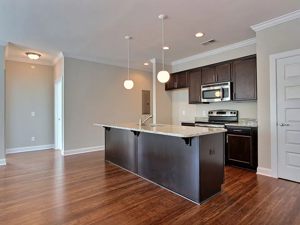 Bright 2BR Apartment in Historic Downtown with Gated Parking Discover modern living in Savannah's...