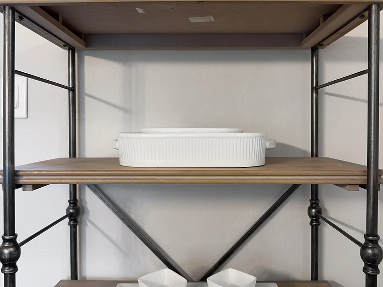 Plenty of extra Storage in the Dining Room with 2 Shelving Units.