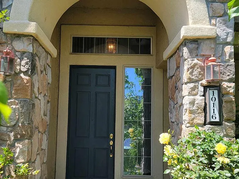 Front entrance semi-private behind beautiful cherry trees (can't see UPS-dropped packages from the street)