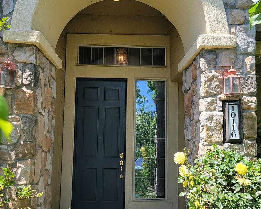 Front entrance semi-private behind beautiful cherry trees (can't see UPS-dropped packages from the street)
