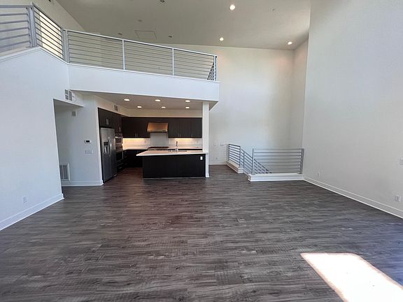 LIVING ROOM, KITCHEN WITH BRIGHT SUN LIGHTS