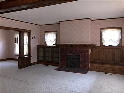 Large Family Room with Original Built-Ins and Fireplace
